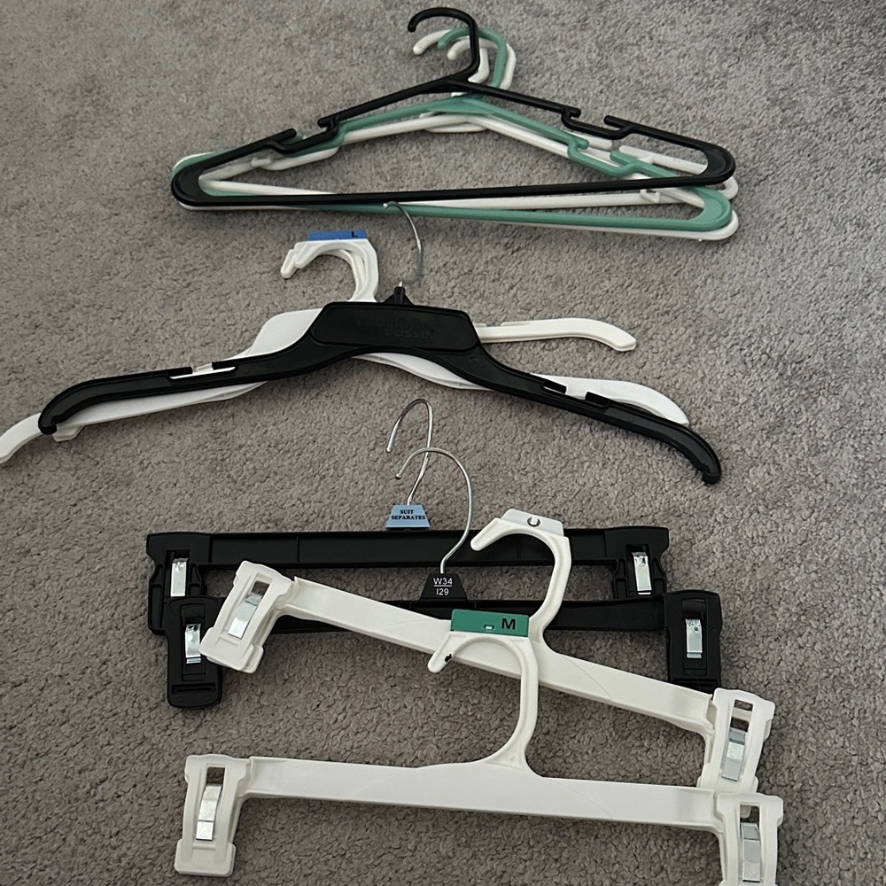 Assorted Plastic Hangers - Black, White, Green